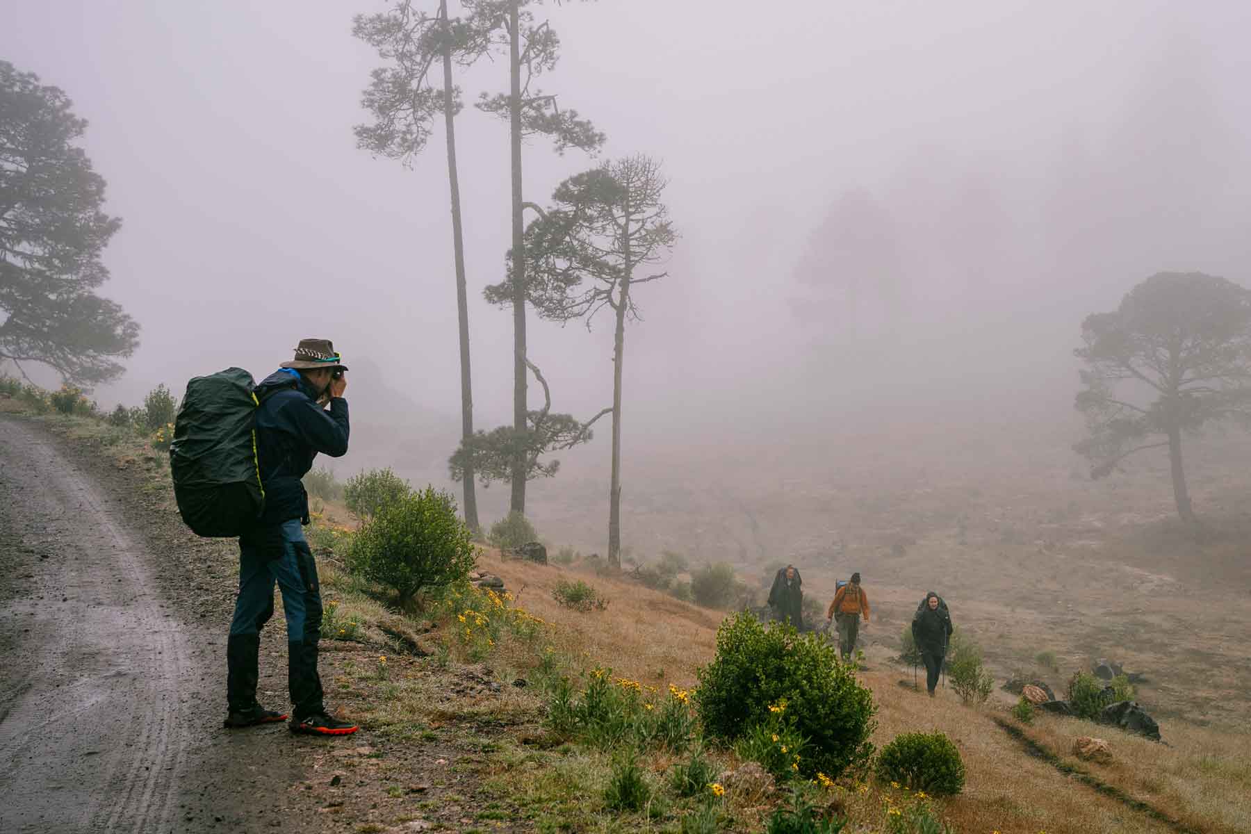 Guide takes photo of guests near Chortiz